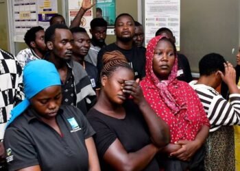 Suspects arrested for public nuisance, inciting violence and obstructing police officers during the recently concluded general elections stand at the City Hall Magistrate’s Court, where they were charged, in Kampala, Uganda, January 19, 2026. REUTERS/Abubaker