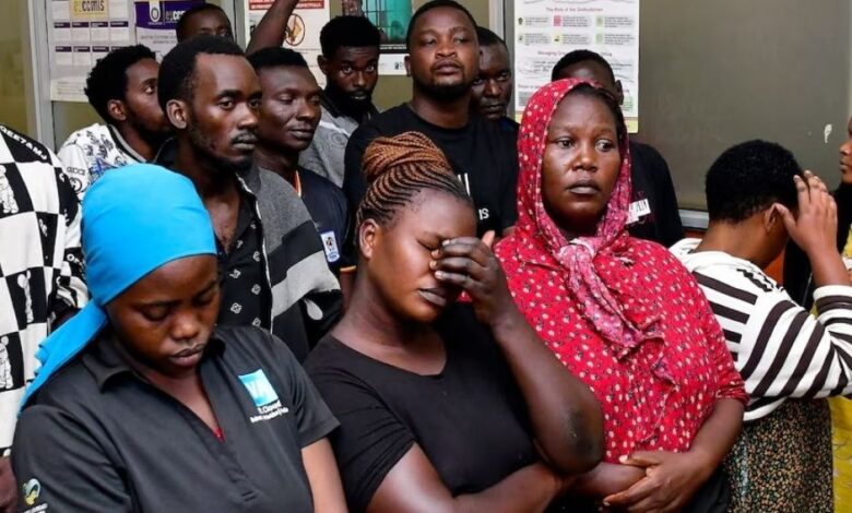 Suspects arrested for public nuisance, inciting violence and obstructing police officers during the recently concluded general elections stand at the City Hall Magistrate’s Court, where they were charged, in Kampala, Uganda, January 19, 2026. REUTERS/Abubaker